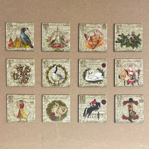 Liminal Puzzle Co 12 Days of Christmas puzzle set featuring vintage illustrations of birds, dancers, and animals. Each 4x4 inch puzzle has 40-50 pieces.